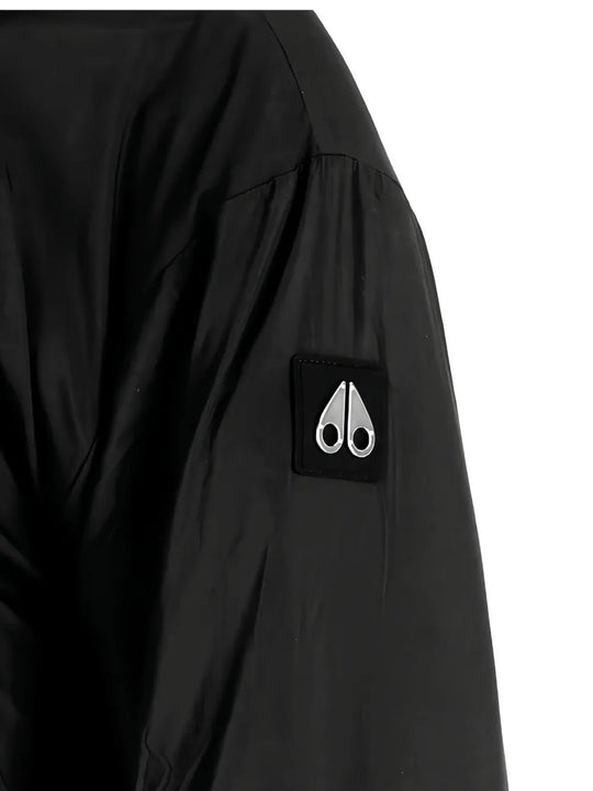 Close up of Black jacket, showing texture of the 100% polyester fabric