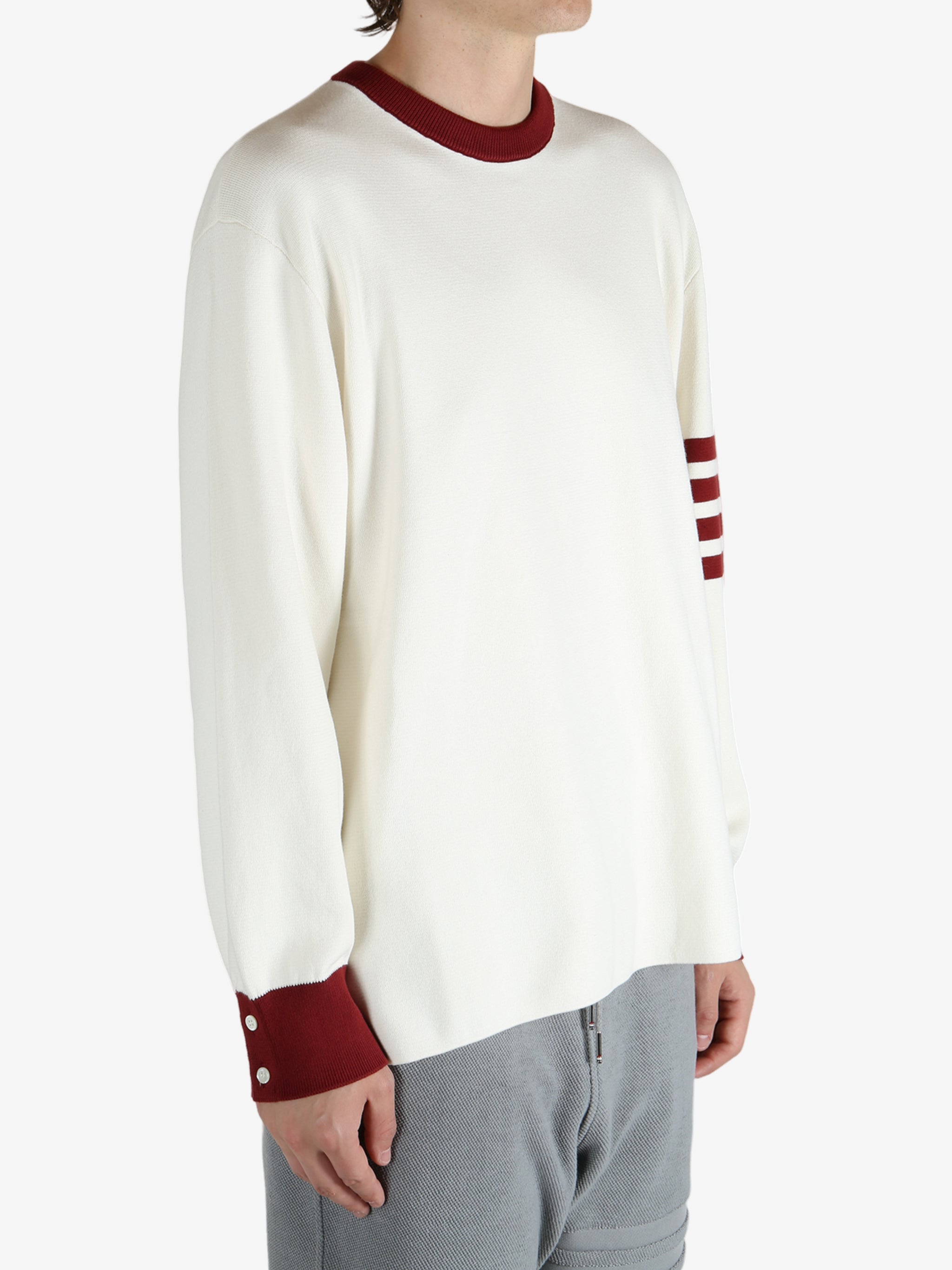 Tan shirts worn by a person, showing the shirts  fit