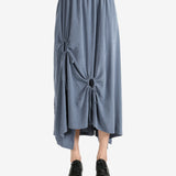 Grey skirt worn by a person, showing the skirt fit