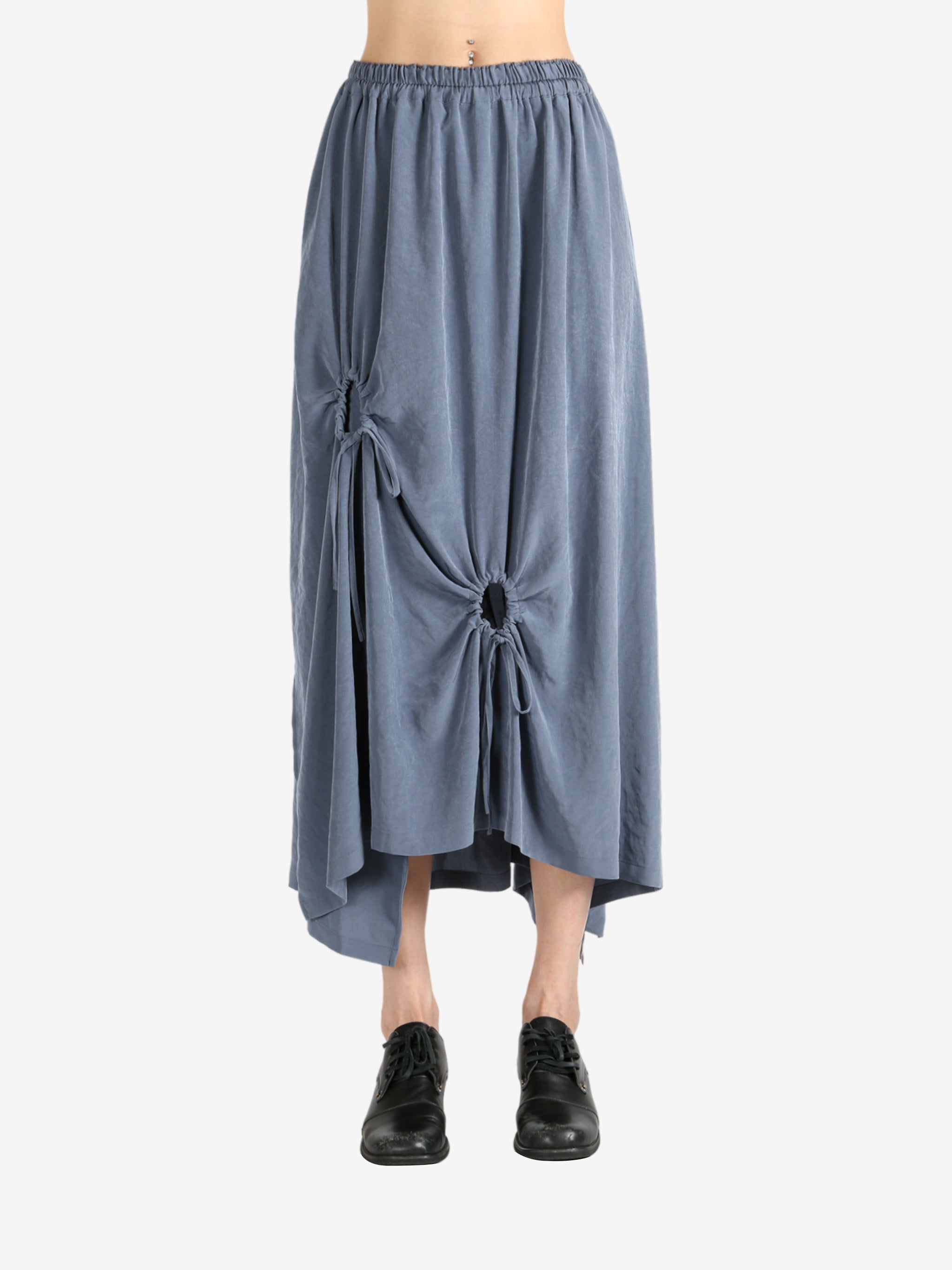 Grey skirt worn by a person, showing the skirt fit