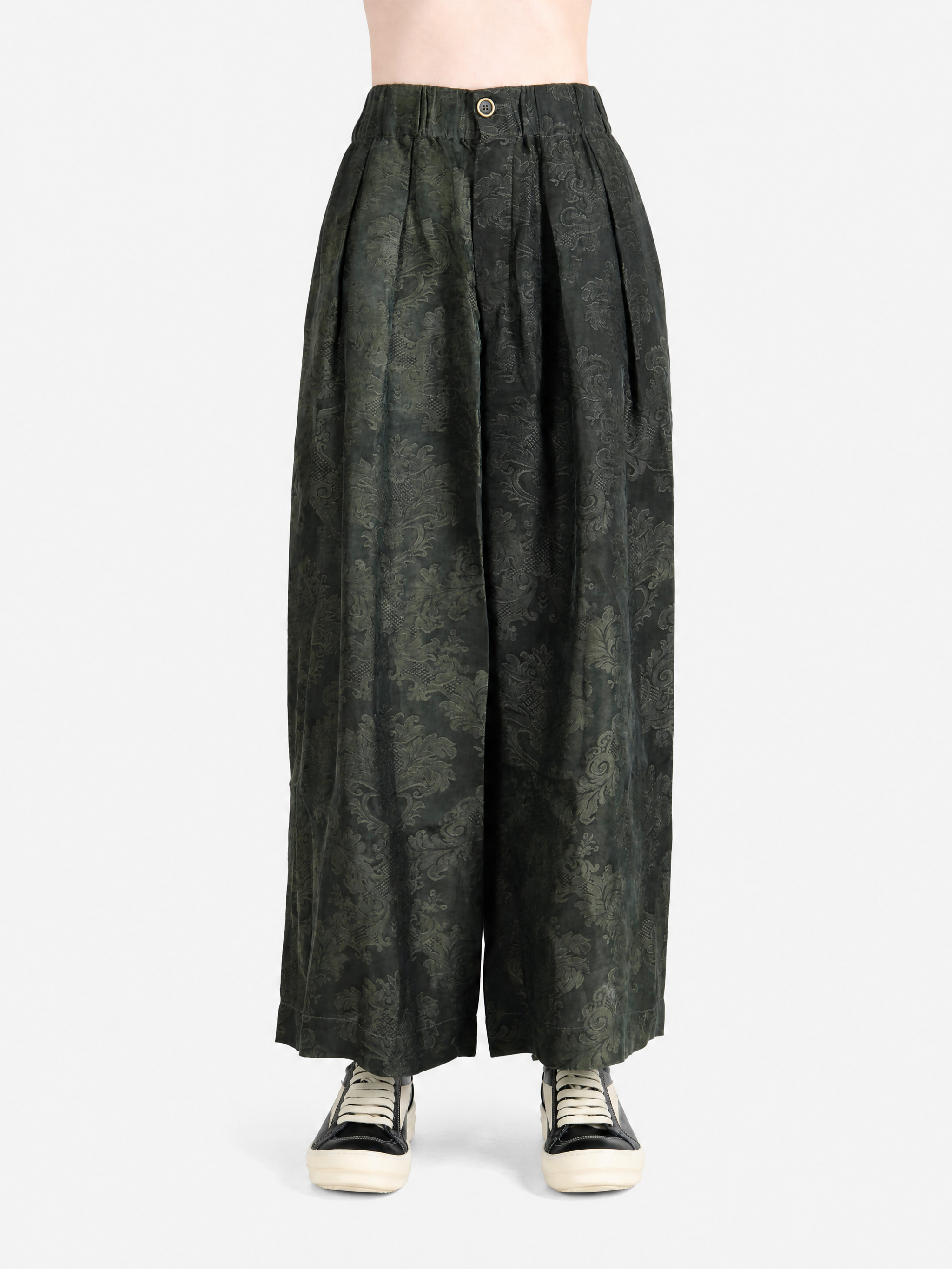 Green pants, full body view