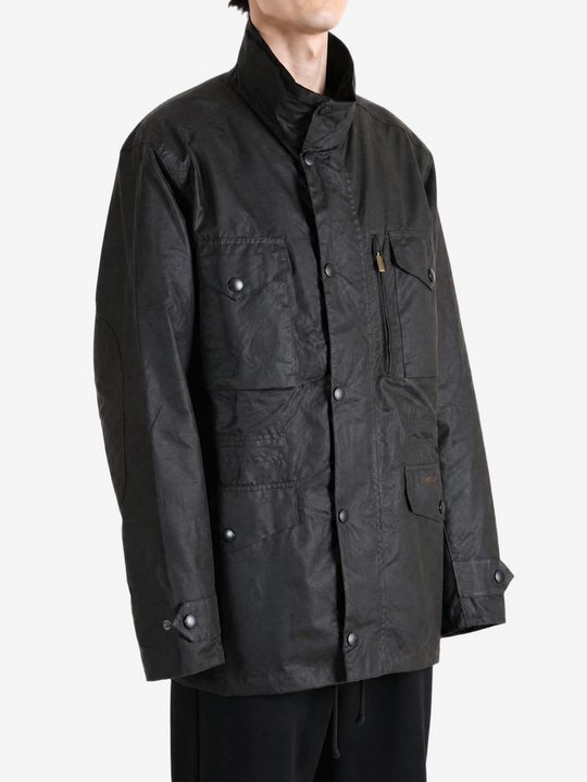 Black jacket worn by a person, showing the jacket fit