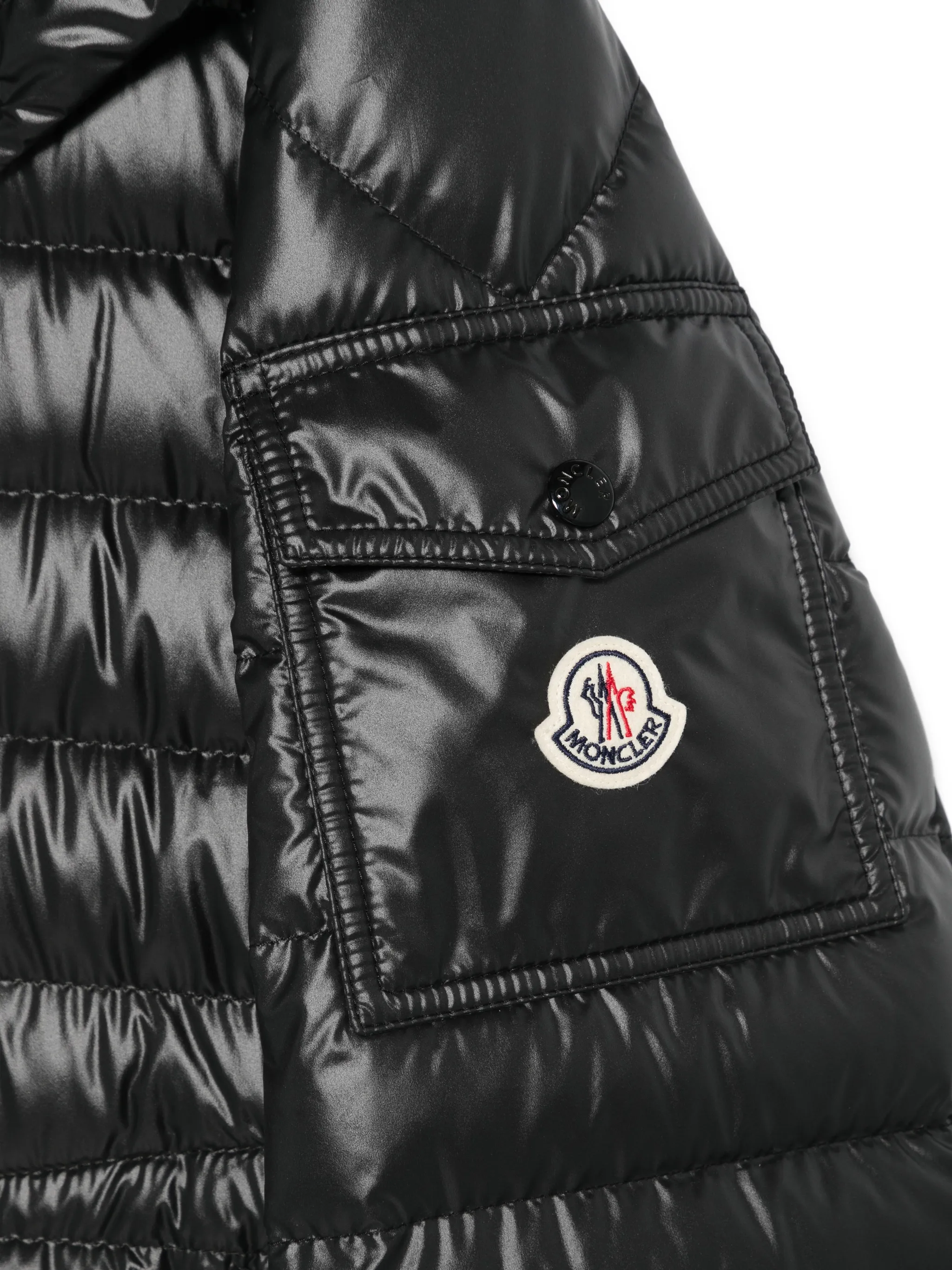 Close up of black jacket, showing texture of the Polyester fabric