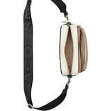 Close up of tan bags, showing texture of the split cow leather and polyurethane coating fabric