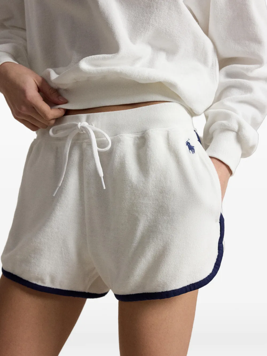 Close up of white short, showing texture of the cotton fabric