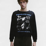 Black sweatshirt worn by a person, showing the sweatshirt's fit