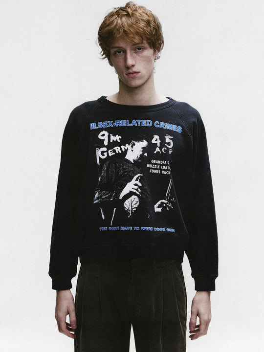 Black sweatshirt worn by a person, showing the sweatshirt's fit