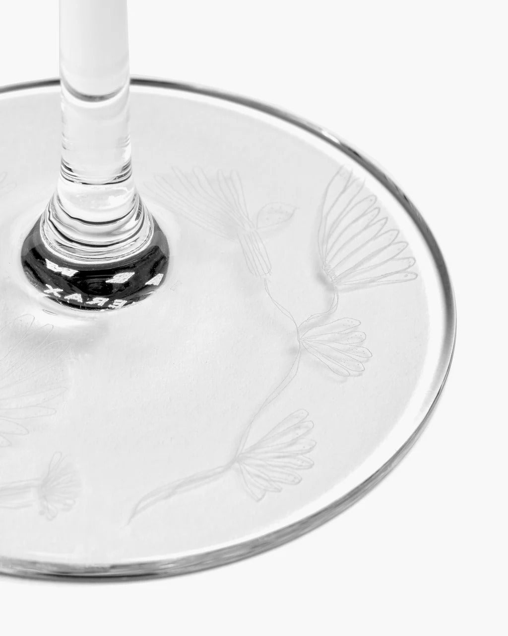 Close up of white glasses, showing texture of the glass fabric