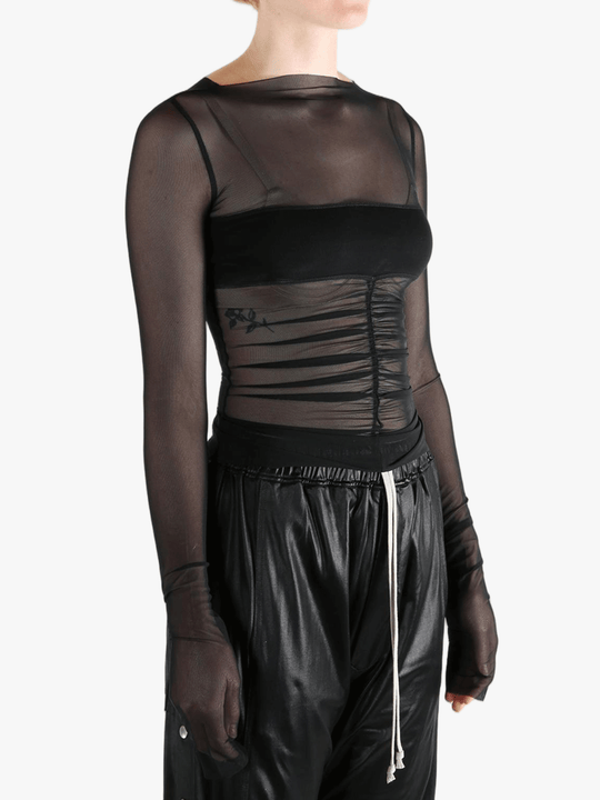 Black top worn by a person, showing the top's fit