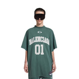 Green t-shirt worn by a person, showing the t-shirt's fit