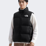 Black vest worn by a person, showing the vest's fit