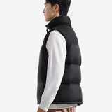 Black vest worn by a person, showing the vest's fit