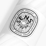 Diptyque perfume bottle cap with brand logo on a white background