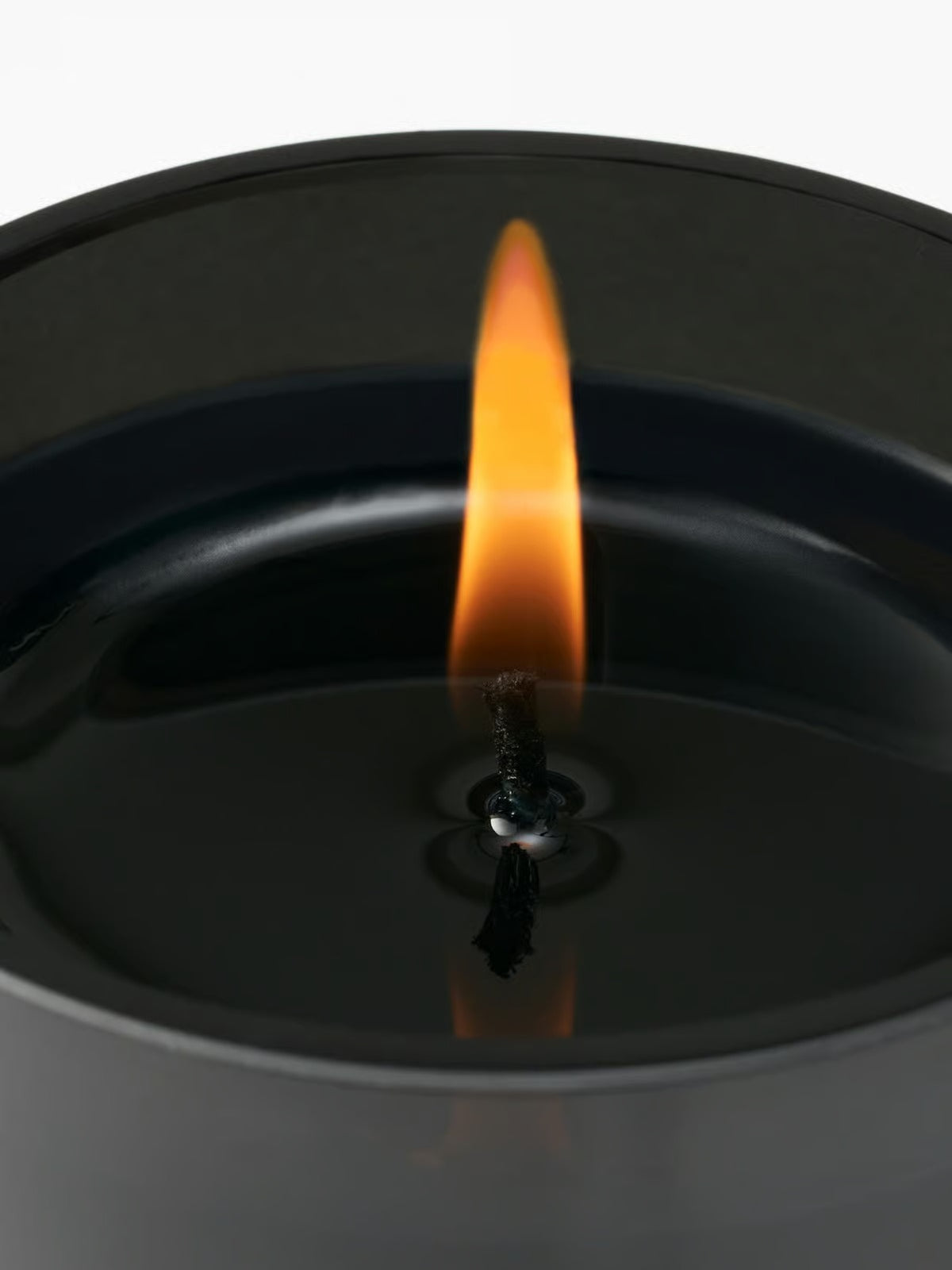 Close up of candle, showing texture of the limonene fabric