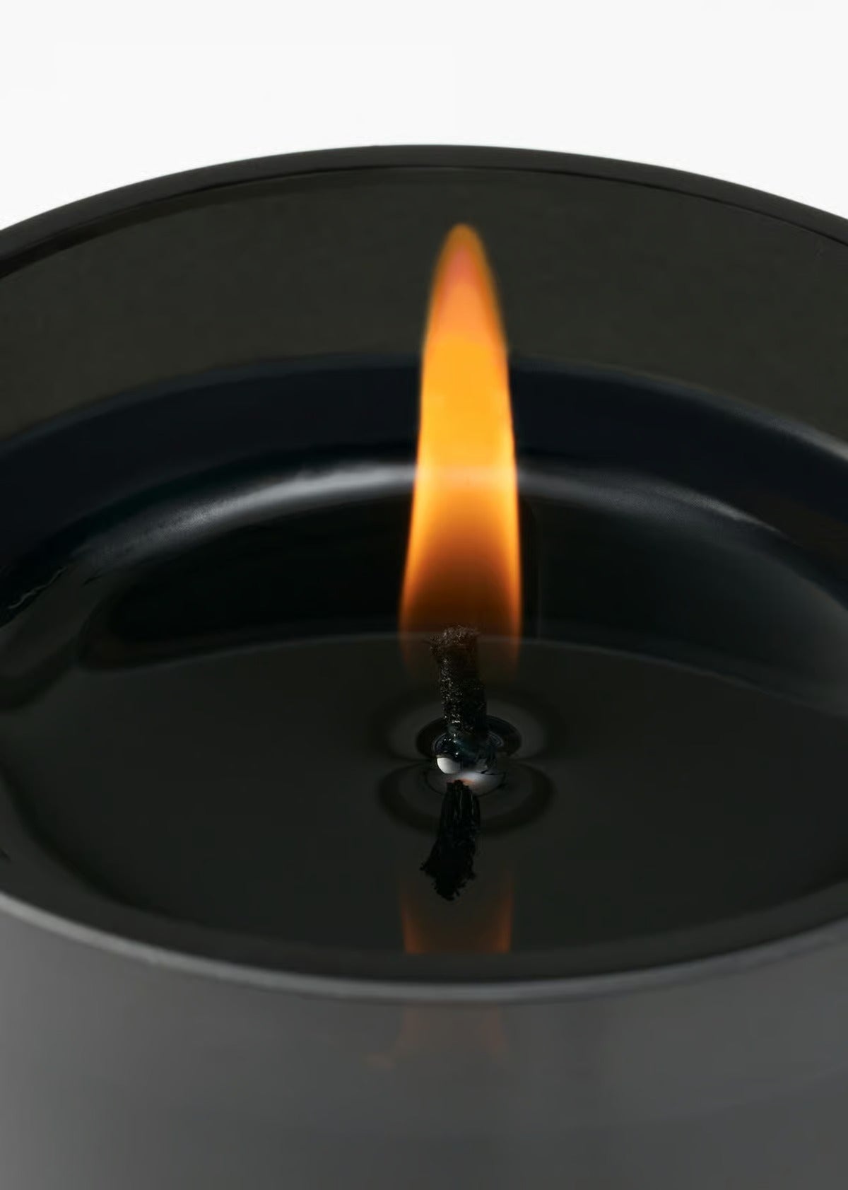 Close up of candle, showing texture of the limonene fabric