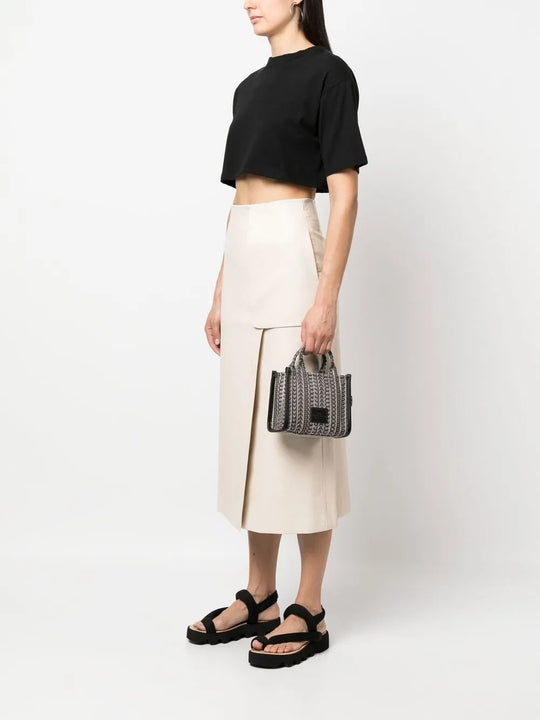 Black bag worn by a person, showing the bag's fit