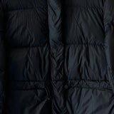 Close up of the black jacket, showing texture of the polyamide fabric