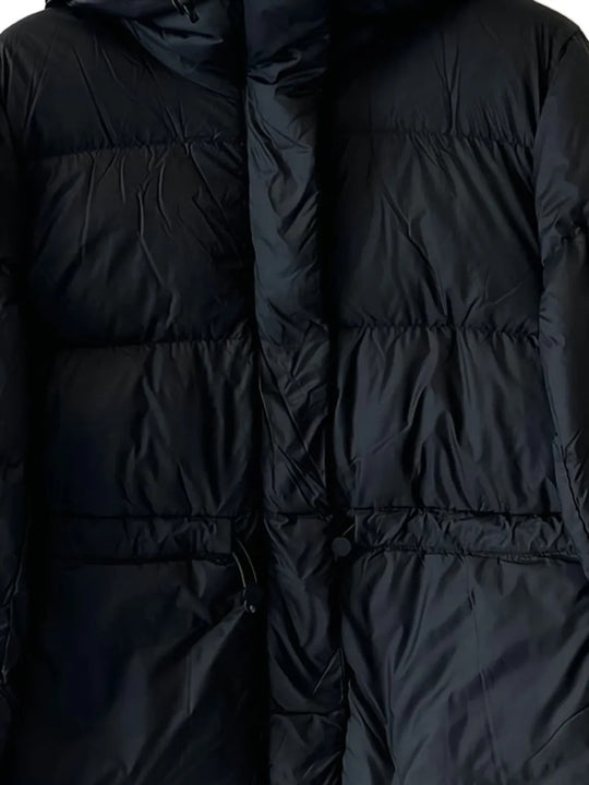 Close up of the black jacket, showing texture of the polyamide fabric