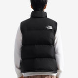 Black vest worn by a person, showing the vest's fit