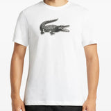 White T-shirt worn by a person, showing the shirt's fit