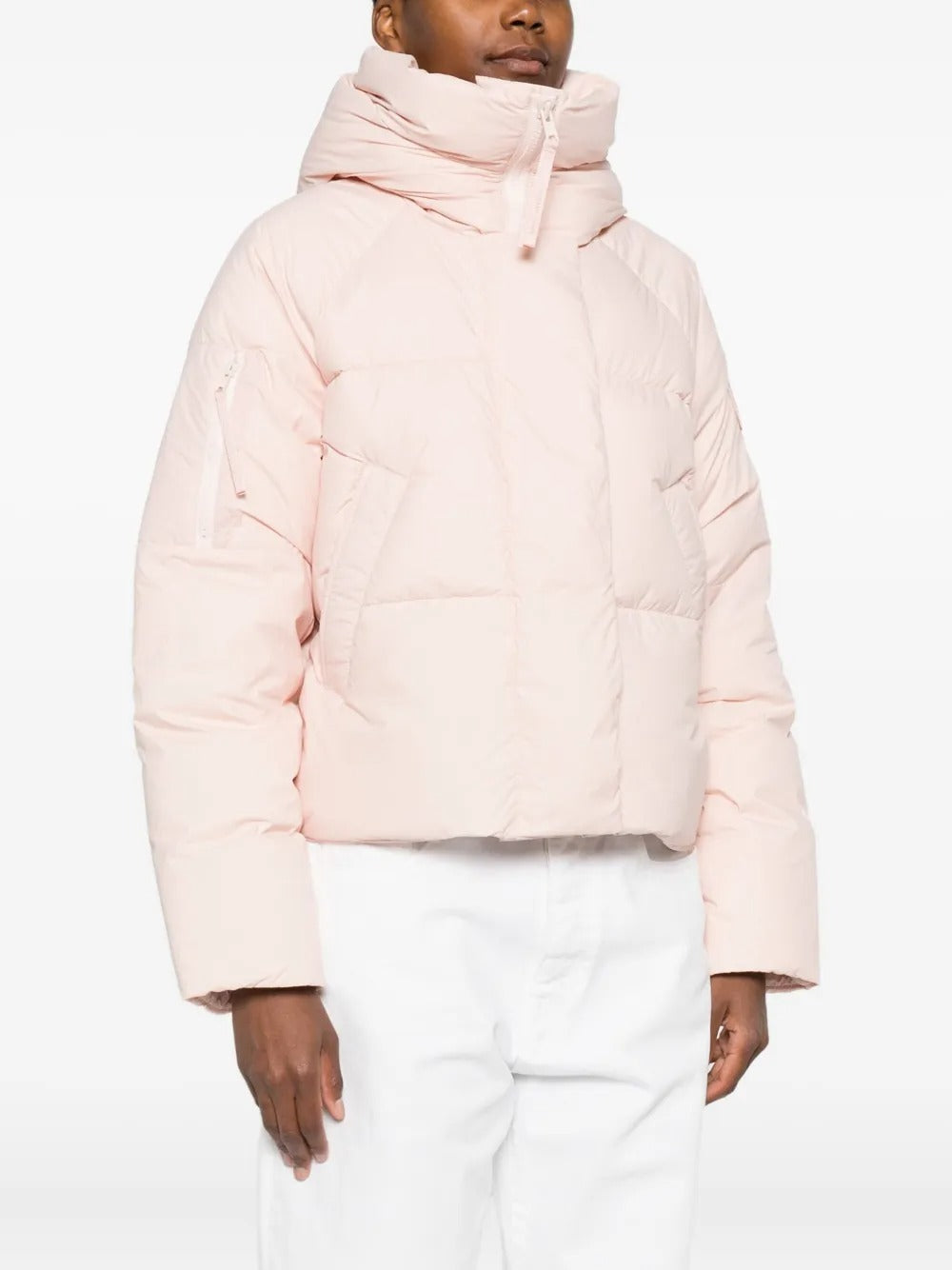 Pink jacket worn by a person, showing the jacket fit