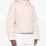 Pink jacket worn by a person, showing the jacket fit