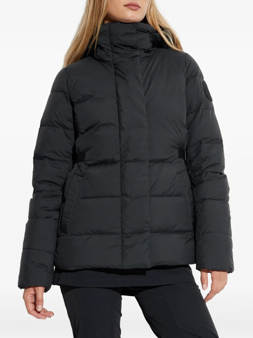 Black jacket worn by a person, showing the jacket's fit