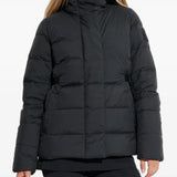 Black jacket worn by a person, showing the jacket's fit