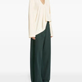 Green pants, full body view