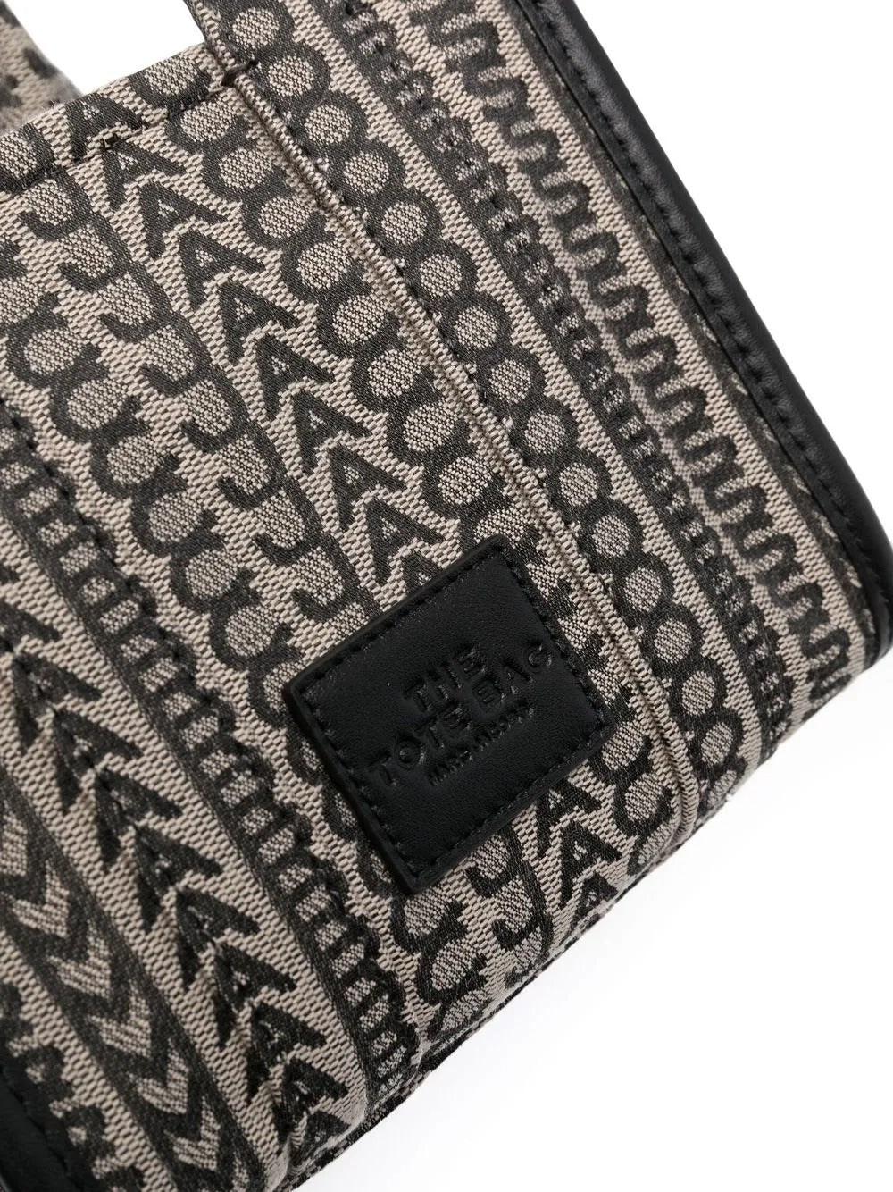Close up of the black bag, showing texture of the cotton fabric