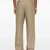 Tan pants worn by a person, showing the pants' fit