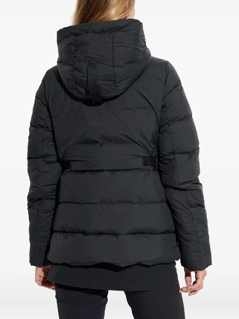 Black jacket worn by a person, showing the jacket's fit