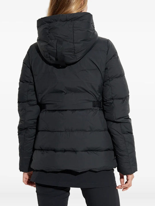 Black jacket worn by a person, showing the jacket's fit