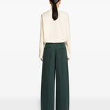 Green pants, full body view