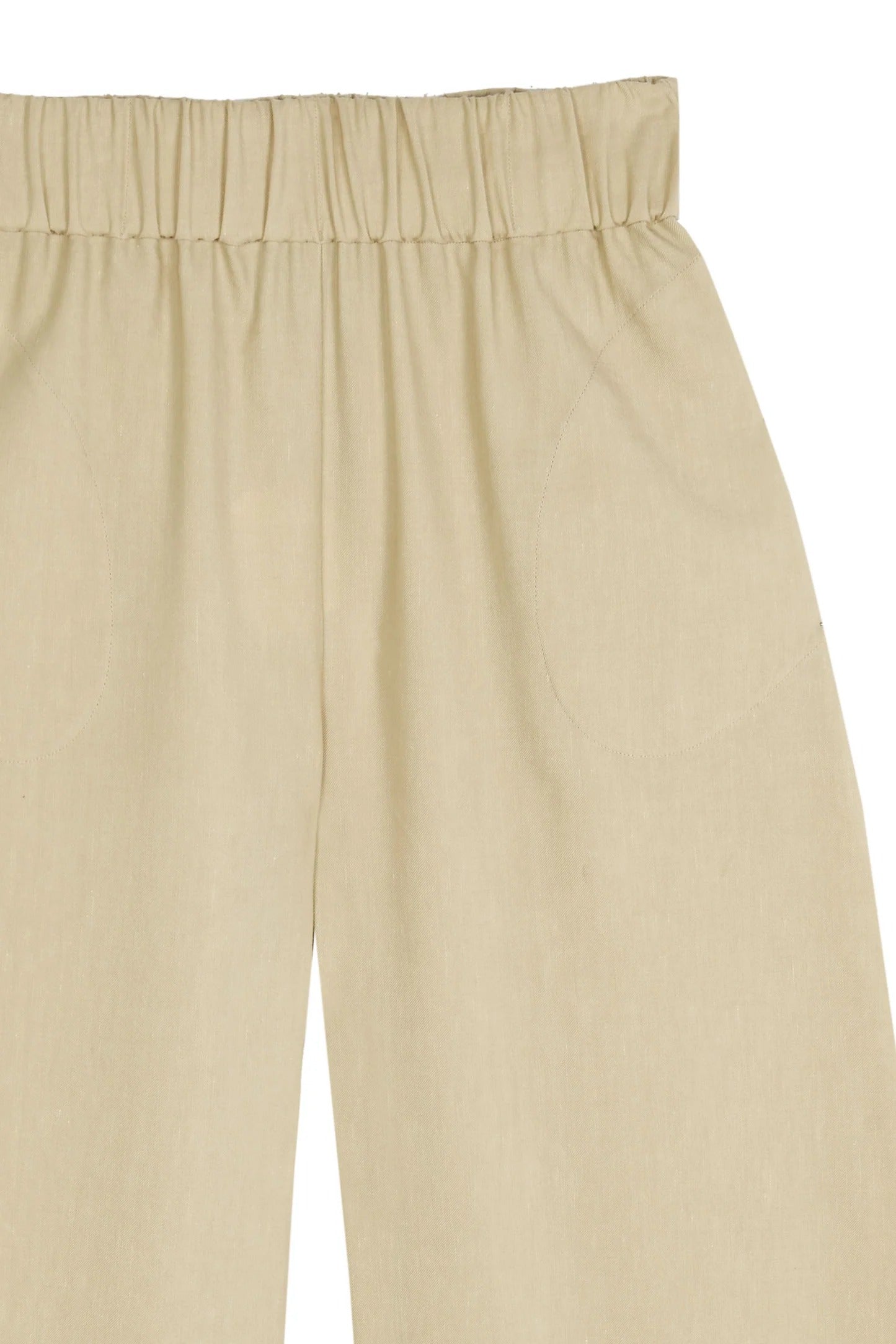 Close up of tan pants, showing texture of the wool fabric