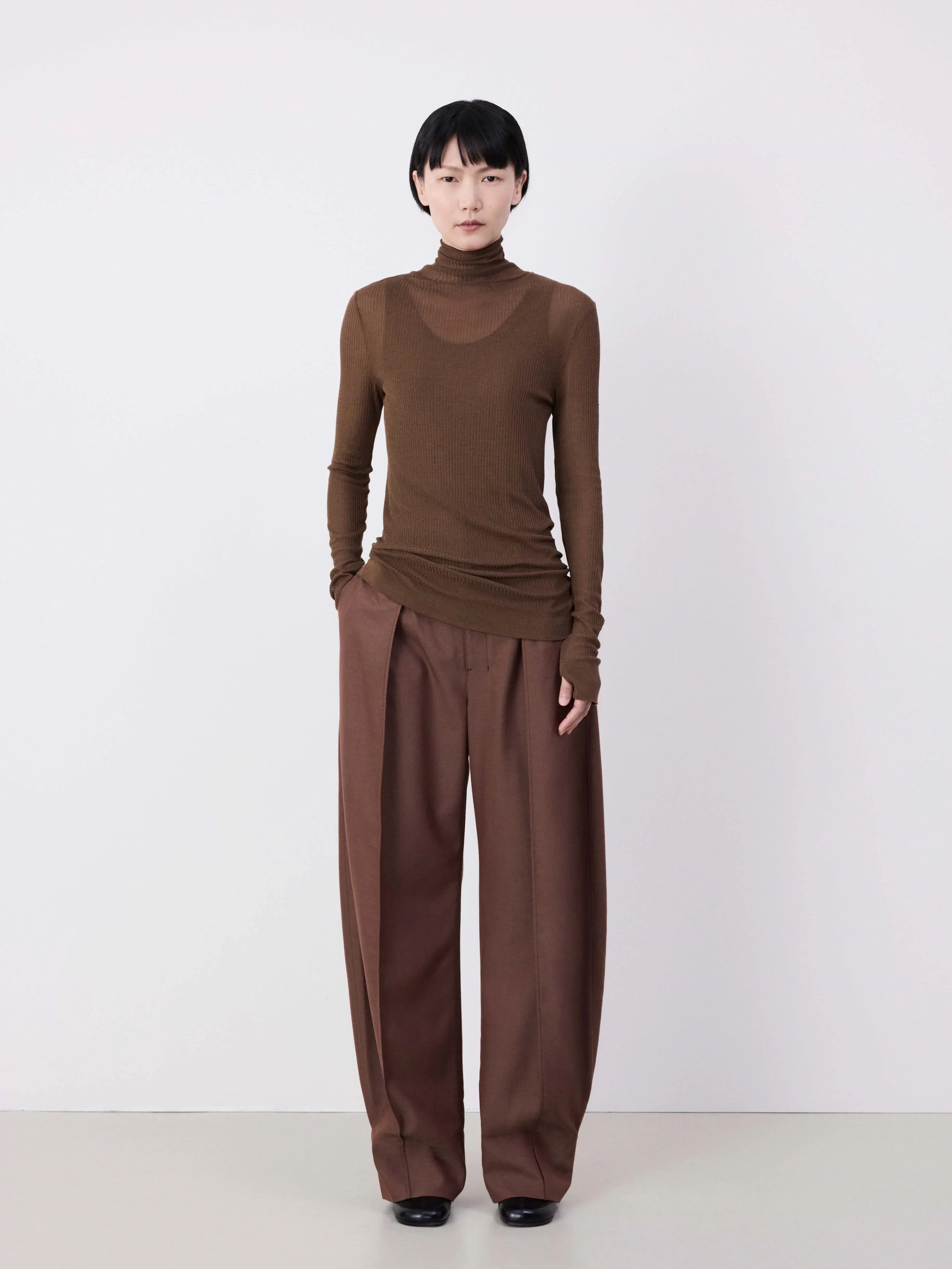 Brown top, full body view