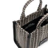 Close up of the black bag, showing texture of the cotton fabric