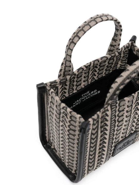 Close up of the black bag, showing texture of the cotton fabric