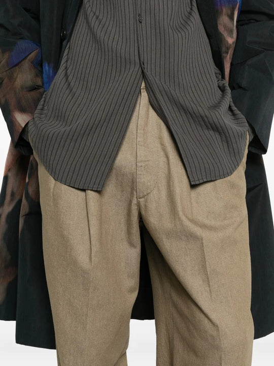 Close up of the tan pants, showing texture of the cotton fabric