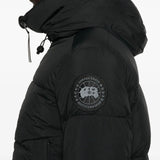 Close up of the black coat, showing texture of the nylon fabric