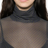 Close up of black top, showing texture of the polyamide fabric