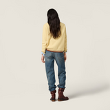 Yellow knitwear, full body view