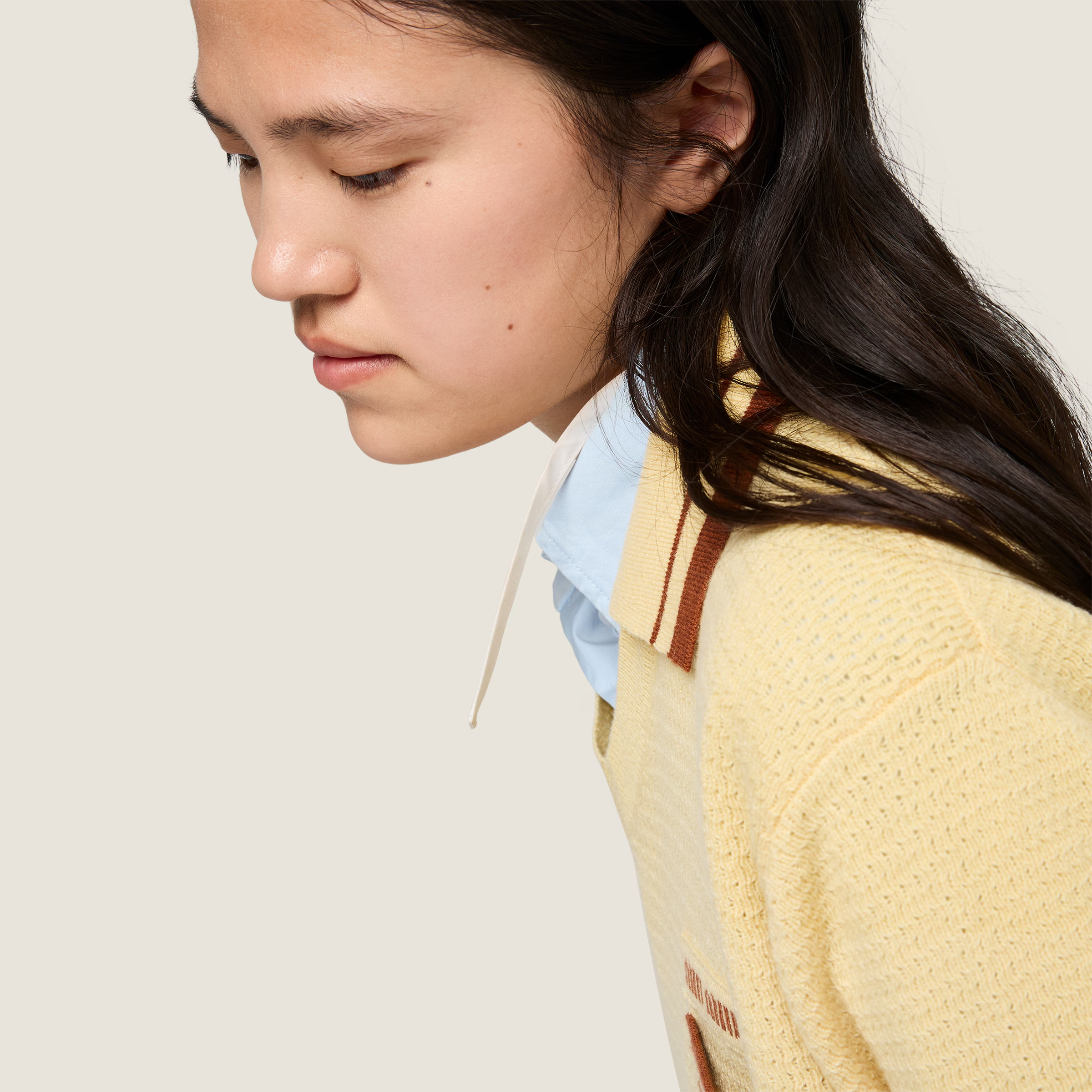 Yellow knitwear, full body view