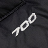Close up of the black vest, showing texture of the nylon fabric
