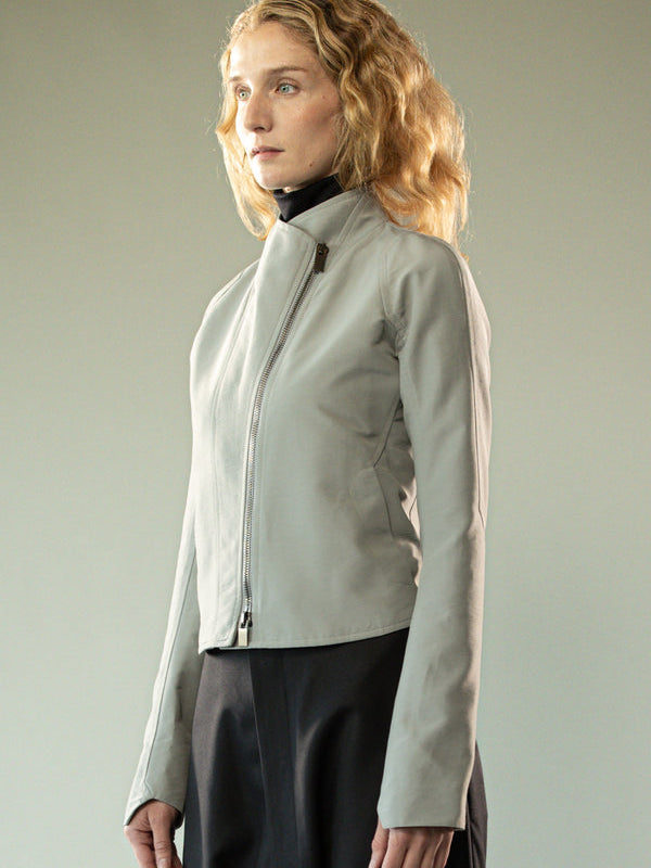 Grey jacket worn y a person, showing the jacket's fit
