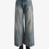 Blue pants worn by a person, showing the pants fit