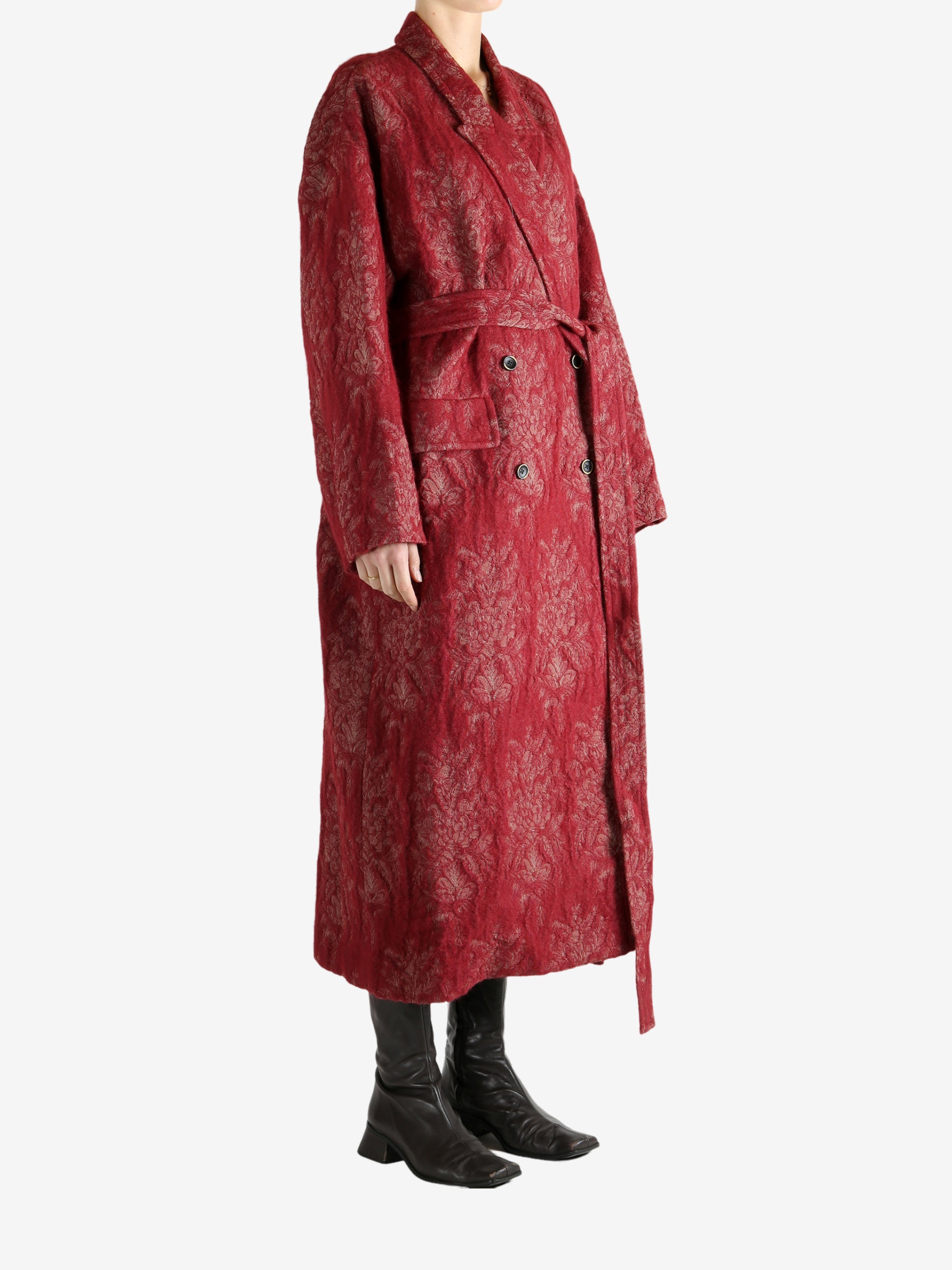 Red jackets worn by a person, showing the jackets fit