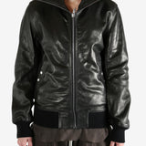 Black jacket worn by a person, showing the jacket's fit