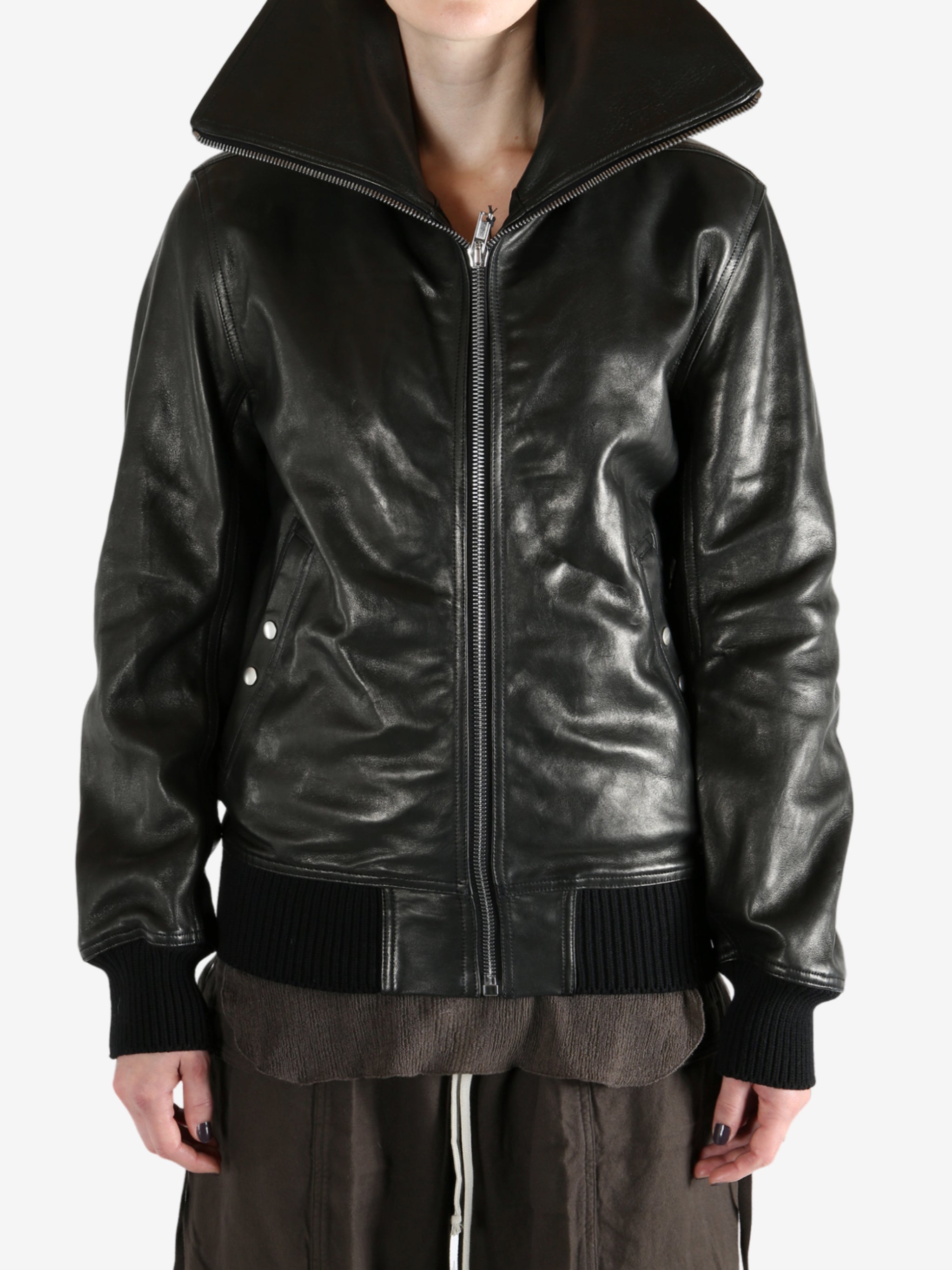 Black jacket worn by a person, showing the jacket's fit