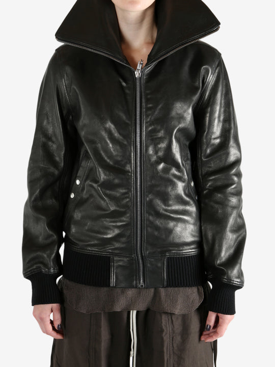 Black jacket worn by a person, showing the jacket's fit